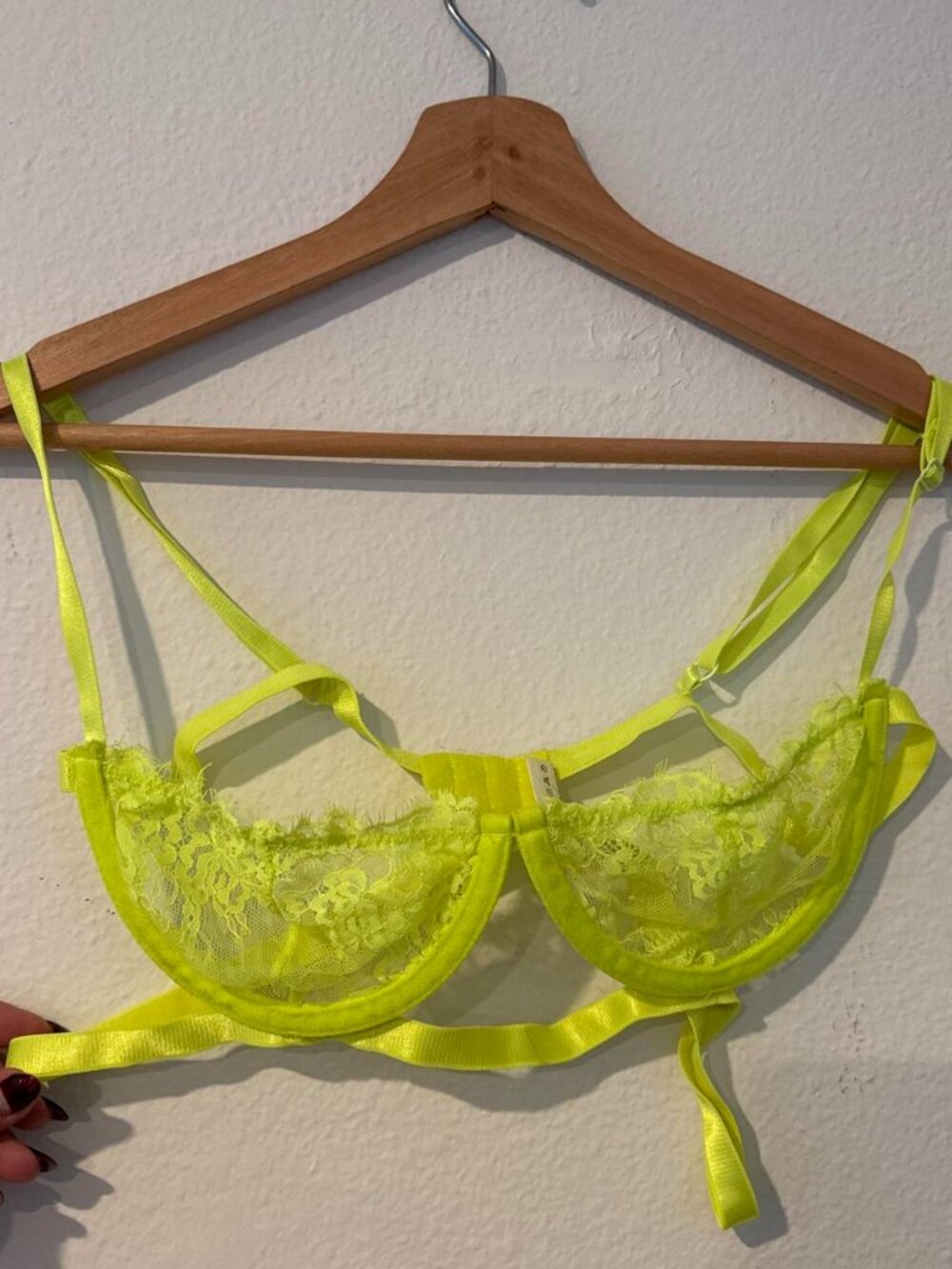 Neon yellow lace bralette with adjustable straps, size M. Polyester & spandex